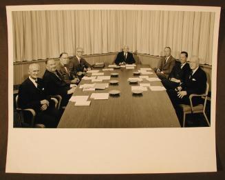 Men at a Conference Table