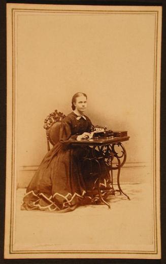 Woman at a Sewing Machine