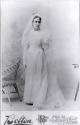 Photograph of Minnie Tatem Satterlee (1867-1908) in her wedding gown.
