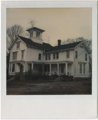 Two-story Italianate house with cupola and covered porch.  Gift of the Richard Welling Family,  ...