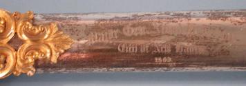Detail of engraved inscription on scabbard