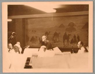 George Heck and Orchestra in front of Desert Mural