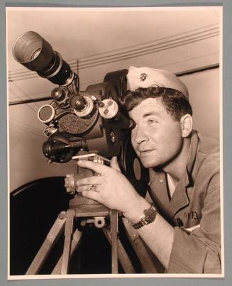 Arthur J. Kiely, Jr. in Uniform with Movie Camera