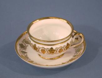 Teacup 1945.1.1397.9 and teacup saucer 1945.1.1397.21