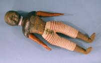 Doll with shirt removed to show construction