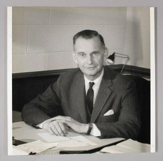 John (Jack) Moore Kelso Davis Seated at a Desk