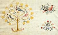 Trees with birds, and flowers.