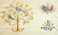 Trees with birds, and flowers.