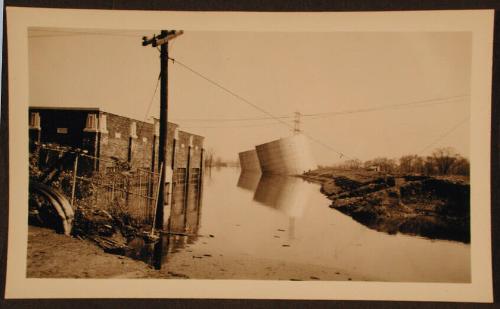 Large Tanks on a Tilt during 1936 Flood, Hartford