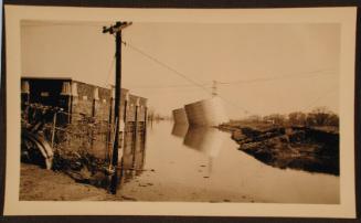 Large Tanks on a Tilt during 1936 Flood, Hartford