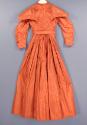 Back of dress with cape.