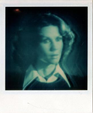 Woman from shoulders up on TV, possibly Kate Jackson, Gift of the Richard Welling Family, 2012.…