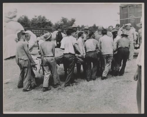 Hartford Circus Fire: Men Carrying Debris or Victims