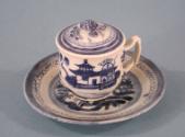 Lidded cup 1986.86.11a,b and saucer 1986.86.12 were used as a set.