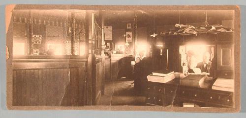 Mr. Hubbard in the Office of the Higganum Cutaway Co.