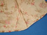 Inside of left side seam at hem.